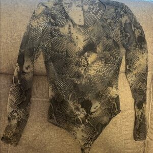 Semi sheer snake print long sleeve thong bodysuit.